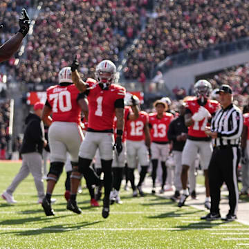 Ohio State Buckeyes wide receiver Jeremiah Smith (4) celebrates a touchdown during the NCAA football game against the Penn State Nittany Lions at Ohio Stadium in Columbus on Nov. 1, 2025.