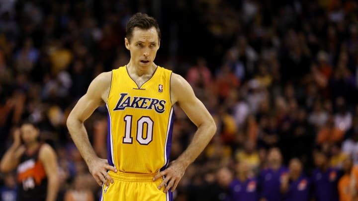 Jan. 30, 2013; Phoenix, AZ, USA: Los Angeles Lakers guard Steve Nash reacts in the second half against the Phoenix Suns at the US Airways Center. The Suns defeated the Lakers 92-86.  Mandatory Credit: Mark J. Rebilas-USA TODAY Sports