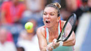 Aug 29, 2022; Flushing, NY, USA; Simona Halep of Romania hits to Daria Snigur of Ukraine on day one of the 2022 U.S. Open tennis tournament at USTA Billie Jean King National Tennis Center. Mandatory Credit: Danielle Parhizkaran-Imagn Images