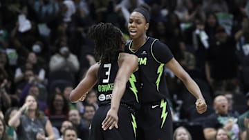 Jun 11, 2025; Seattle, Washington, USA; Seattle Storm forward Nneka Ogwumike (3) celebrates with Seattle Storm center Dominique Malonga (14) after a score against the Minnesota Lynx during the second half at Climate Pledge Arena. Mandatory Credit: John Froschauer-Imagn Images