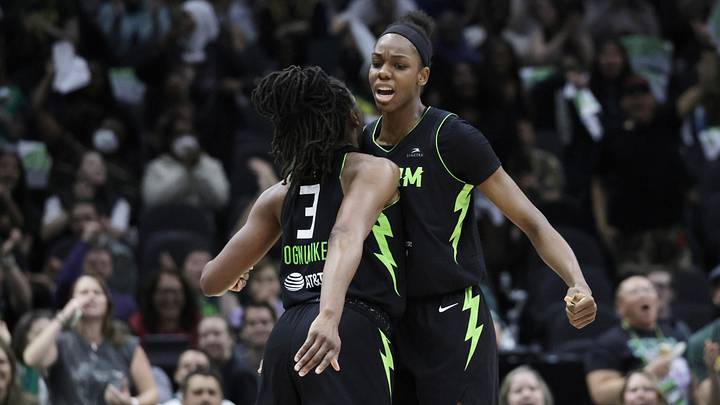 Jun 11, 2025; Seattle, Washington, USA; Seattle Storm forward Nneka Ogwumike (3) celebrates with Seattle Storm center Dominique Malonga (14) after a score against the Minnesota Lynx during the second half at Climate Pledge Arena. Mandatory Credit: John Froschauer-Imagn Images