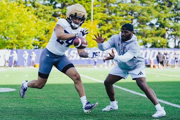 Makell Esteen breaks on the ball during a UW spring drill. 