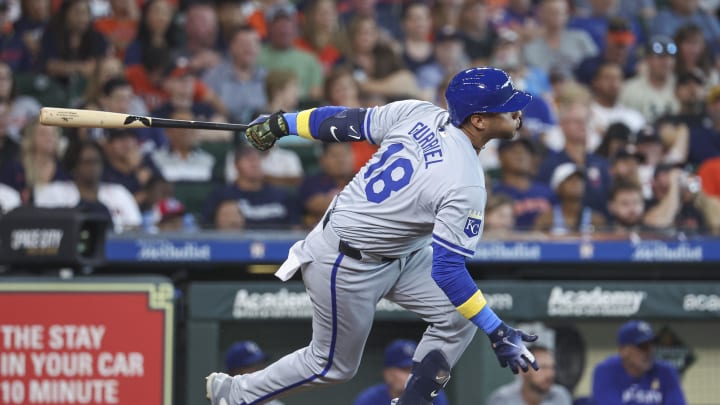 Sep 1, 2024; Houston, Texas, USA; Kansas City Royals designated hitter Yuli Gurriel (18) hits an RBI single during the sixth inning against the Houston Astros at Minute Maid Park. Mandatory Credit: Troy Taormina-USA TODAY Sports