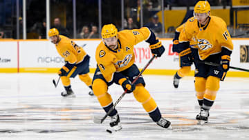 Nov 4, 2024; Nashville, Tennessee, USA;  Nashville Predators left wing Filip Forsberg (9) skates with the puck against the Los Angeles Kings during the third period at Bridgestone Arena. Mandatory Credit: Steve Roberts-Imagn Images