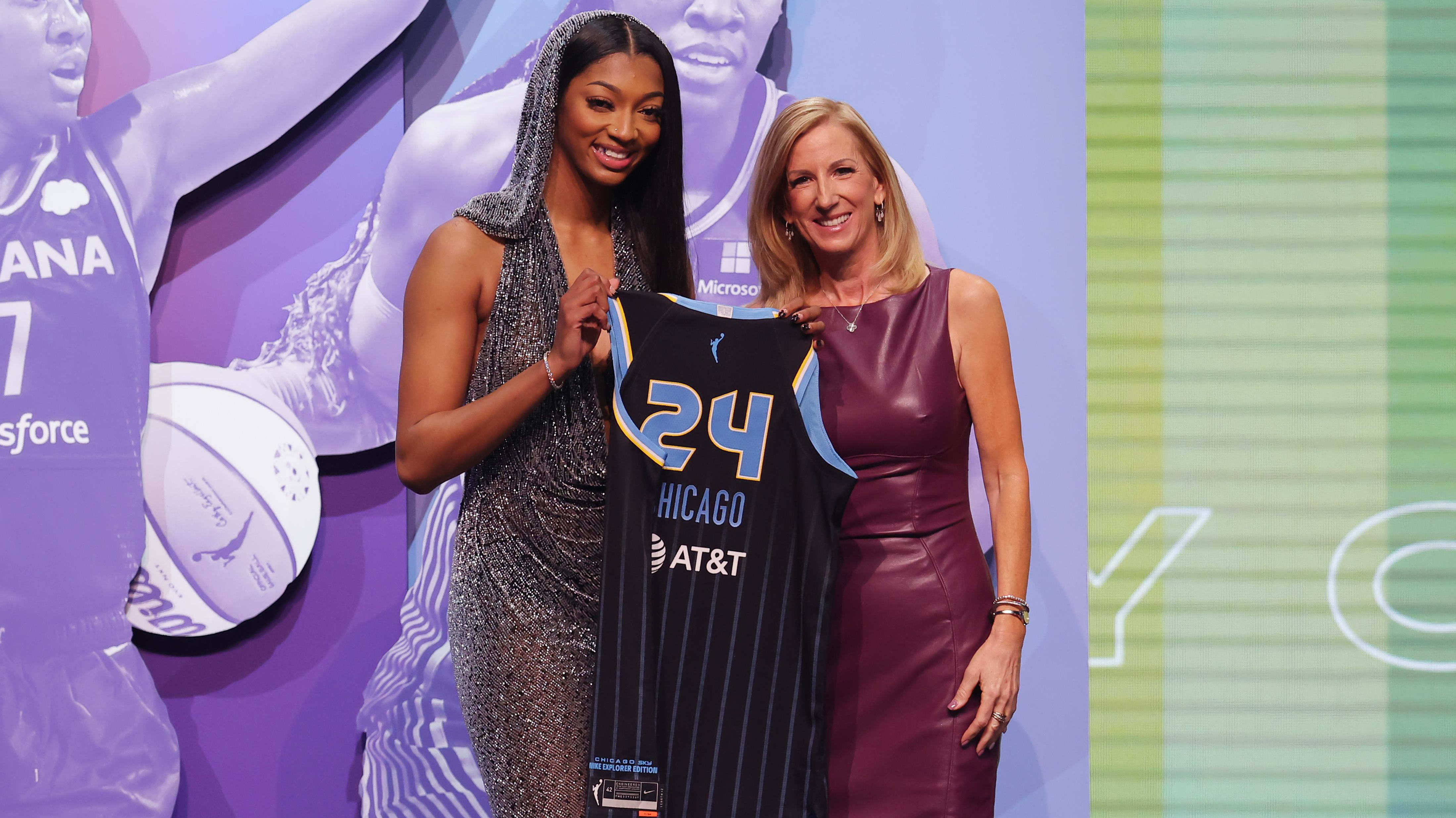 Angel Reese poses with WNBA commissioner Cathy Engelbert