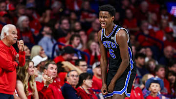 Feb 22, 2025; Tucson, Arizona, USA; BYU Cougars forward Kanon Catchings (6) celebrates after he making a three-point basket during the second half against the Arizona Wildcats  at McKale Center. Mandatory Credit: Aryanna Frank-Imagn Images