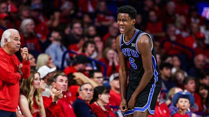 Feb 22, 2025; Tucson, Arizona, USA; BYU Cougars forward Kanon Catchings (6) celebrates after he making a three-point basket during the second half against the Arizona Wildcats at McKale Center. Mandatory Credit: Aryanna Frank-Imagn Images Feb 22, 2025; Tucson, Arizona, USA; BYU Cougars forward Kanon Catchings (6) celebrates after he making a three-point basket during the second half against the Arizona Wildcats at McKale Center. Mandatory Credit: Aryanna Frank-Imagn Images