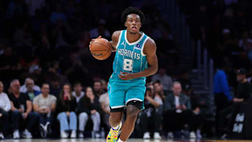 Oct 28, 2025; Miami, Florida, USA; Charlotte Hornets guard Collin Sexton (8) dribbles the basketball against the Miami Heat during the second quarter at Kaseya Center. Mandatory Credit: Sam Navarro-Imagn Images