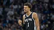 Dec 29, 2024; Minneapolis, Minnesota, USA; San Antonio Spurs center Victor Wembanyama (1) celebrates after making a shot against the Minnesota Timberwolves in the second half at Target Center. Mandatory Credit: Jesse Johnson-Imagn Images