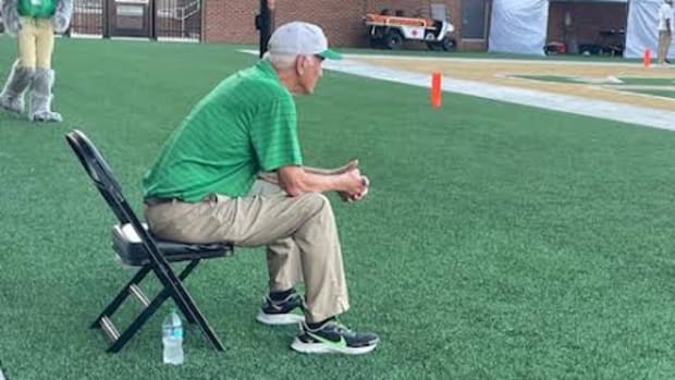 Former Buford head coach and athletic director Dexter Wood takes in the game on a field named after him.