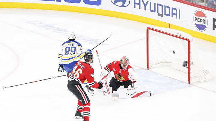 Apr 13, 2026; Chicago, Illinois, USA; Buffalo Sabres right wing Alex Tuch (89) scores a goal against Chicago Blackhawks goaltender Spencer Knight (30) during the third period at United Center. Mandatory Credit: Kamil Krzaczynski-Imagn Images
