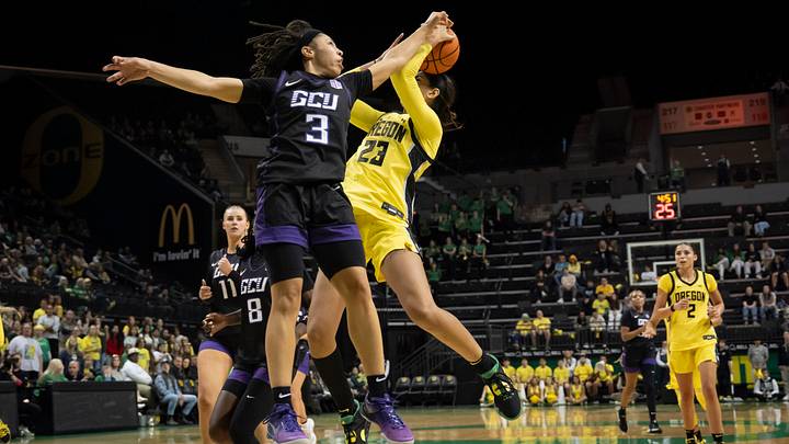 Grand Canyon guard Ale'jah Douglas fouls Oregon forward Sarah Rambus as the Oregon Ducks host the Grand Canyon Antelopes Nov. 11, 2025, at Matthew Knight Arena in Eugene, Oregon.