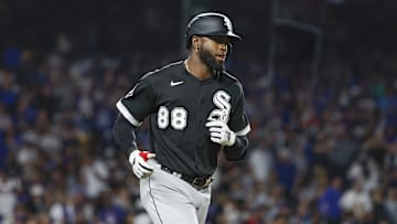 Chicago White Sox center fielder Luis Robert Jr. (88) rounds the bases after hitting a solo home run against the Chicago Cubs during the seventh inning at Wrigley Field. Mandatory Credit: Kamil Krzaczynski-Imagn Images