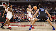Nov 27, 2025; Chicago, Illinois, USA; Arkansas Razorbacks guard Darius Acuff Jr. (5) looks to pass the ball against Duke Blue Devils during the first half at United Center. Mandatory Credit: Kamil Krzaczynski-Imagn Images