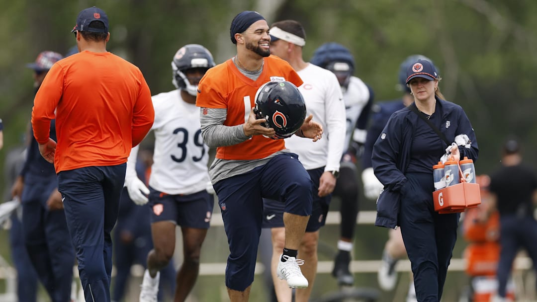 Jun 3, 2025; Lake Forest, IL, USA; Chicago Bears quarterback Caleb Williams (18) warms up during minicamp at Halas Hall. Mandatory Credit: Kamil Krzaczynski-Imagn Images