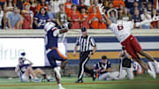 Sep 20, 2025; Charlottesville, Virginia, USA; Virginia Cavaliers wide receiver Trell Harris (11) catches a touchdown pass as Stanford Cardinal cornerback Collin Wright (6) defends during the first quarter at Scott Stadium. Mandatory Credit: Geoff Burke-Imagn Images