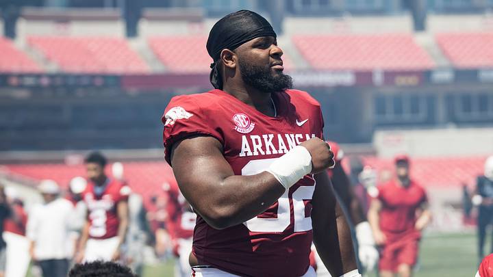 Apr 25, 2026; Fayetteville, AR, USA; Arkansas Razorbacks defensive lineman David Oke (92) gets ready to play in the  spring game at Donald W. Reynolds Razorback Stadium. Mandatory Credit: Brett Rojo-Imagn Images