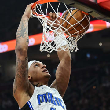 Apr 30, 2024; Cleveland, Ohio, USA; Orlando Magic forward Paolo Banchero (5) dunks during the first half against the Cleveland Cavaliers in game five of the first round for the 2024 NBA playoffs at Rocket Mortgage FieldHouse. Mandatory Credit: Ken Blaze-USA TODAY Sports
