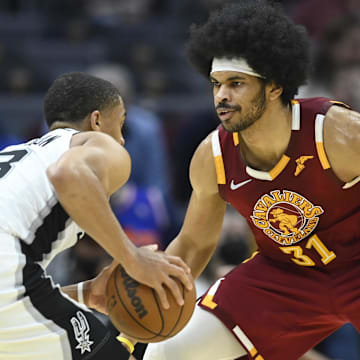 Feb 9, 2022; Cleveland, Ohio, USA; Cleveland Cavaliers center Jarrett Allen (31) defends San Antonio Spurs forward Keldon Johnson (3) in the third quarter at Rocket Mortgage FieldHouse. Mandatory Credit: David Richard-Imagn Images