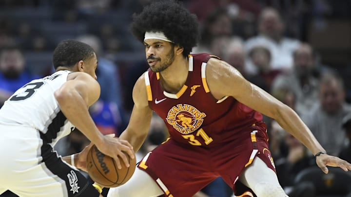 Feb 9, 2022; Cleveland, Ohio, USA; Cleveland Cavaliers center Jarrett Allen (31) defends San Antonio Spurs forward Keldon Johnson (3) in the third quarter at Rocket Mortgage FieldHouse. Mandatory Credit: David Richard-Imagn Images