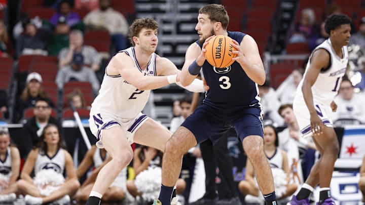 Mar 10, 2026; Chicago, IL, USA; Northwestern Wildcats forward Nick Martinelli (2) defends against Penn State Nittany Lions forward Ivan Juric (3) during the second half at United Center. Mandatory Credit: Kamil Krzaczynski-Imagn Images