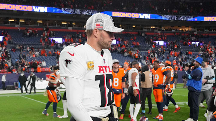 Nov 17, 2024; Denver, Colorado, USA; Atlanta Falcons quarterback Kirk Cousins (18) following the loss to the Denver Broncos at Empower Field at Mile High.