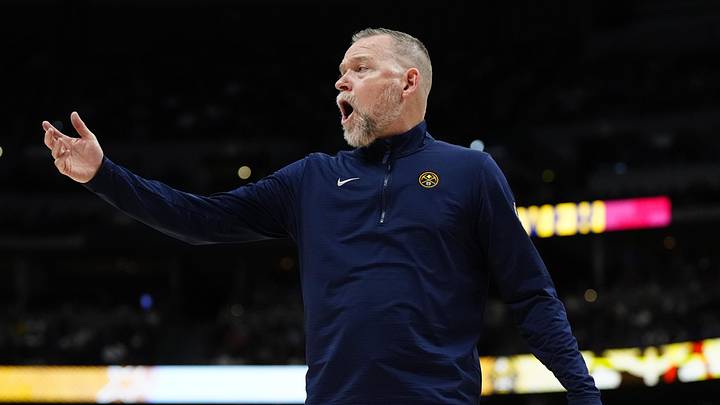 Apr 6, 2025; Denver, Colorado, USA; Denver Nuggets head coach Michael Malone reacts in the second half against the Indiana Pacers at Ball Arena. Mandatory Credit: Ron Chenoy-Imagn Images