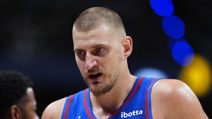 Apr 20, 2026; Denver, Colorado, USA; Denver Nuggets center Nikola Jokic (15) walks to the bench in the second quarter against the Minnesota Timberwolves during game two of the first round of the 2026 NBA Playoffs at Ball Arena. Mandatory Credit: Ron Chenoy-Imagn Images