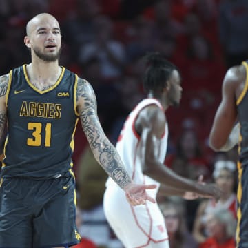 Dec 13, 2022; Houston, Texas, USA; North Carolina A&T Aggies forward Duncan Powell (31) reacts after a play during the first half against the Houston Cougars at Fertitta Center. Mandatory Credit: Troy Taormina-USA TODAY Sports