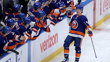 Oct 11, 2025; Elmont, New York, USA; New York Islanders defenseman Matthew Schaefer (48) celebrates his goal against the Washington Capitals with teammates during the third period at UBS Arena. The goal was the first of his NHL career. Mandatory Credit: Brad Penner-Imagn Images