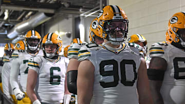 Jan 12, 2025; Philadelphia, Pennsylvania, USA; Green Bay Packers defensive end Lukas Van Ness (90) waits in the tunnel against the Philadelphia Eagles in an NFC wild card game at Lincoln Financial Field.