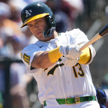 Apr 13, 2025; West Sacramento, California, USA; Athletics third baseman Gio Urshela (13) prepares to bat against the New York Mets during the second inning at Sutter Health Park. Mandatory Credit: Darren Yamashita-Imagn Images