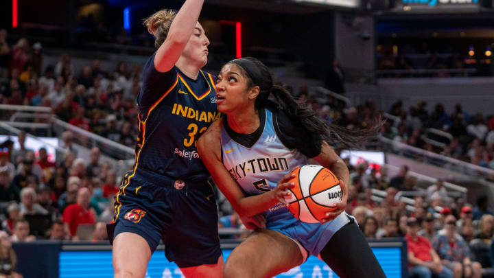 Chicago Sky forward Angel Reese looks to shoot the ball while being guarded by Indiana Fever forward Katie Lou Samuelson during a game at Gainbridge Fieldhouse in Indianapolis. 