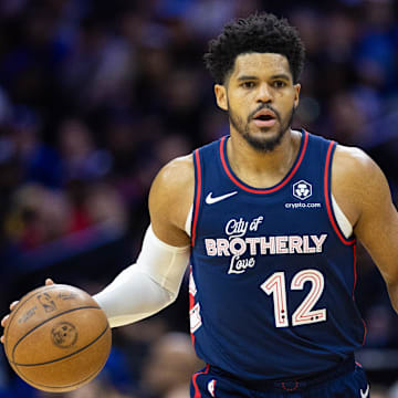 Apr 9, 2024; Philadelphia, Pennsylvania, USA; Philadelphia 76ers forward Tobias Harris (12) dribbles the ball against the Detroit Pistons during the first quarter at Wells Fargo Center. Mandatory Credit: Bill Streicher-Imagn Images