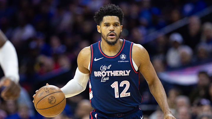 Apr 9, 2024; Philadelphia, Pennsylvania, USA; Philadelphia 76ers forward Tobias Harris (12) dribbles the ball against the Detroit Pistons during the first quarter at Wells Fargo Center. Mandatory Credit: Bill Streicher-Imagn Images