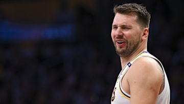 Mar 22, 2025; Los Angeles, California, USA; Los Angeles Lakers guard Luka Doncic (77) reacts to a foul call against the Chicago Bulls during the first half at Crypto.com Arena. Mandatory Credit: Jonathan Hui-Imagn Images