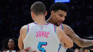 Jan 27, 2025; Miami, Florida, USA; Miami Heat center Kel'el Ware (7) celebrates with forward Nikola Jovic (5) after the game against the Orlando Magic at Kaseya Center. Mandatory Credit: Sam Navarro-Imagn Images