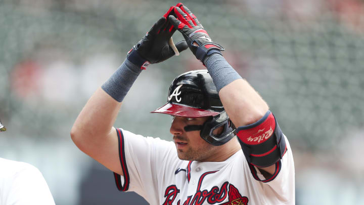 Atlanta Braves third baseman Austin Riley (27) celebrates his single in a game against the Miami Marlins in the sixth inning at Truist Park.