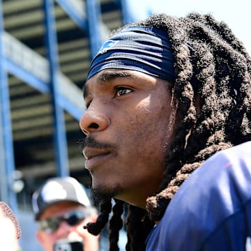 Aug 1, 2023; Foxborough, MA, USA; New England Patriots safety Kyle Dugger (23) answers questions from the media during a press conference at training camp at Gillette Stadium. Mandatory Credit: Eric Canha-Imagn Images