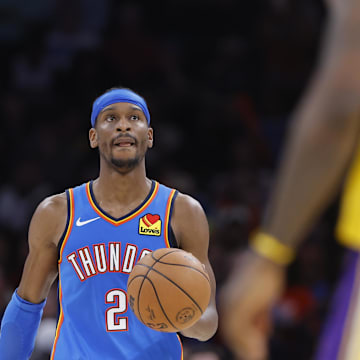 Apr 8, 2025; Oklahoma City, Oklahoma, USA; Oklahoma City Thunder guard Shai Gilgeous-Alexander (2) dribbles down the court against the Los Angeles Lakers during the second half at Paycom Center. Mandatory Credit: Alonzo Adams-Imagn Images