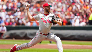 Jun 16, 2024; Baltimore, Maryland, USA; Philadelphia Phillies pitcher Zach Wheeler (45) delivers a pitch against the Baltimore Orioles during the first inning at Oriole Park at Camden Yards. Mandatory Credit: Gregory Fisher-USA TODAY Sports
