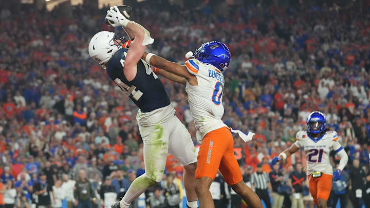Penn State Nittany Lions tight end Tyler Warren catches a touchdown pass over Boise State Broncos safety Ty Benefield Penn State Nittany Lions tight end Tyler Warren catches a touchdown pass over Boise State Broncos safety Ty Benefield