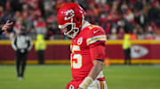 Dec 7, 2025; Kansas City, Missouri, USA; Kansas City Chiefs quarterback Patrick Mahomes (15) lowers his head during the fourth quarter against the Houston Texans at GEHA Field at Arrowhead Stadium. Mandatory Credit: Denny Medley-Imagn Images
