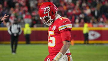 Dec 7, 2025; Kansas City, Missouri, USA; Kansas City Chiefs quarterback Patrick Mahomes (15) lowers his head during the fourth quarter against the Houston Texans at GEHA Field at Arrowhead Stadium. Mandatory Credit: Denny Medley-Imagn Images