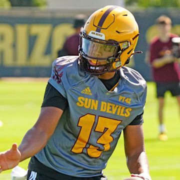 Arizona State quarterback Cameron Dyer (13) fakes a hand-off during the first day of fall practice in Tempe, Ariz. on July 30, 2025.