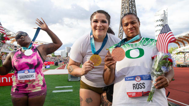 Oregon’s Jaida Ross, right, joins her fellow Olympic Team shot putters Raven Saunders, left, and Chase Jackson with their med