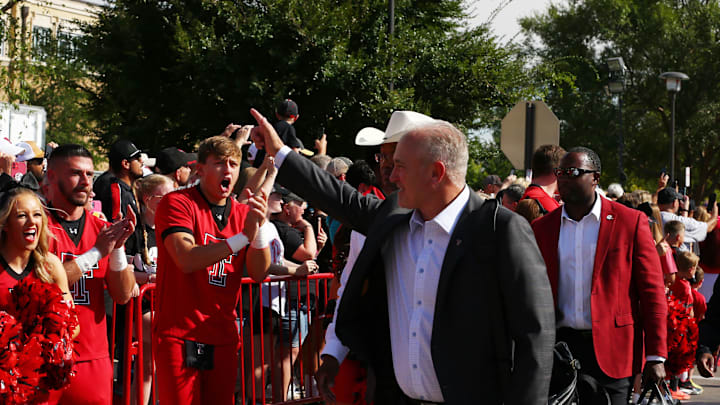 Sep 3, 2022; Lubbock, Texas, USA;  Texas Tech Red Raiders head coach Joey McGuire greets fans before the game between the Texas Tech Red Raiders and the Murray State Racers at Jones AT&T Stadium and Cody Campbell Field. Mandatory Credit: Michael C. Johnson-Imagn Images