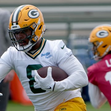 Packers running back Josh Jacobs (8) carries during minicamp.