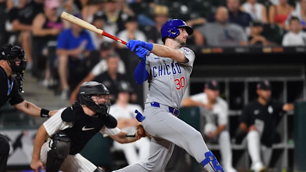 Kyle Tucker hitting a single