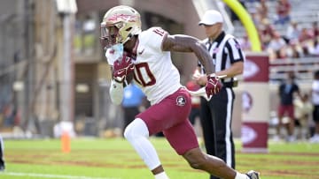 Apr 20, 2024; Tallahassee, Florida, USA; Florida State Seminoles wide receiver Malik Benson (10) runs with the ball during the Spring Showcase at Doak S. Campbell Stadium. Mandatory Credit: Melina Myers-USA TODAY Sports